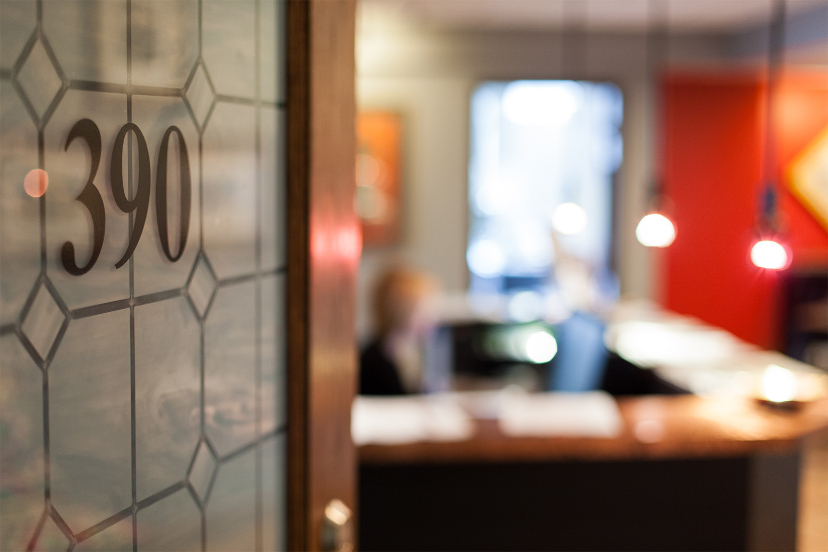 The front door to Hathaway Strategies is open; the entranceway is out of focus